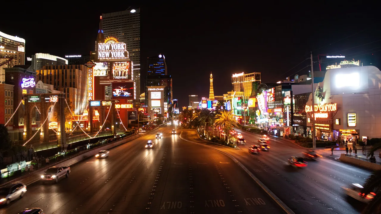 Experience the illuminated Las Vegas Strip with iconic hotels, lights, and bustling nightlife