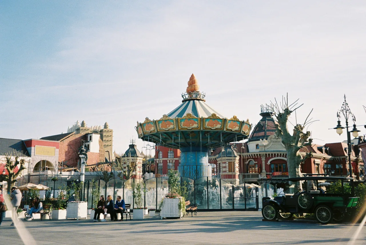 A colorful building with a carousel